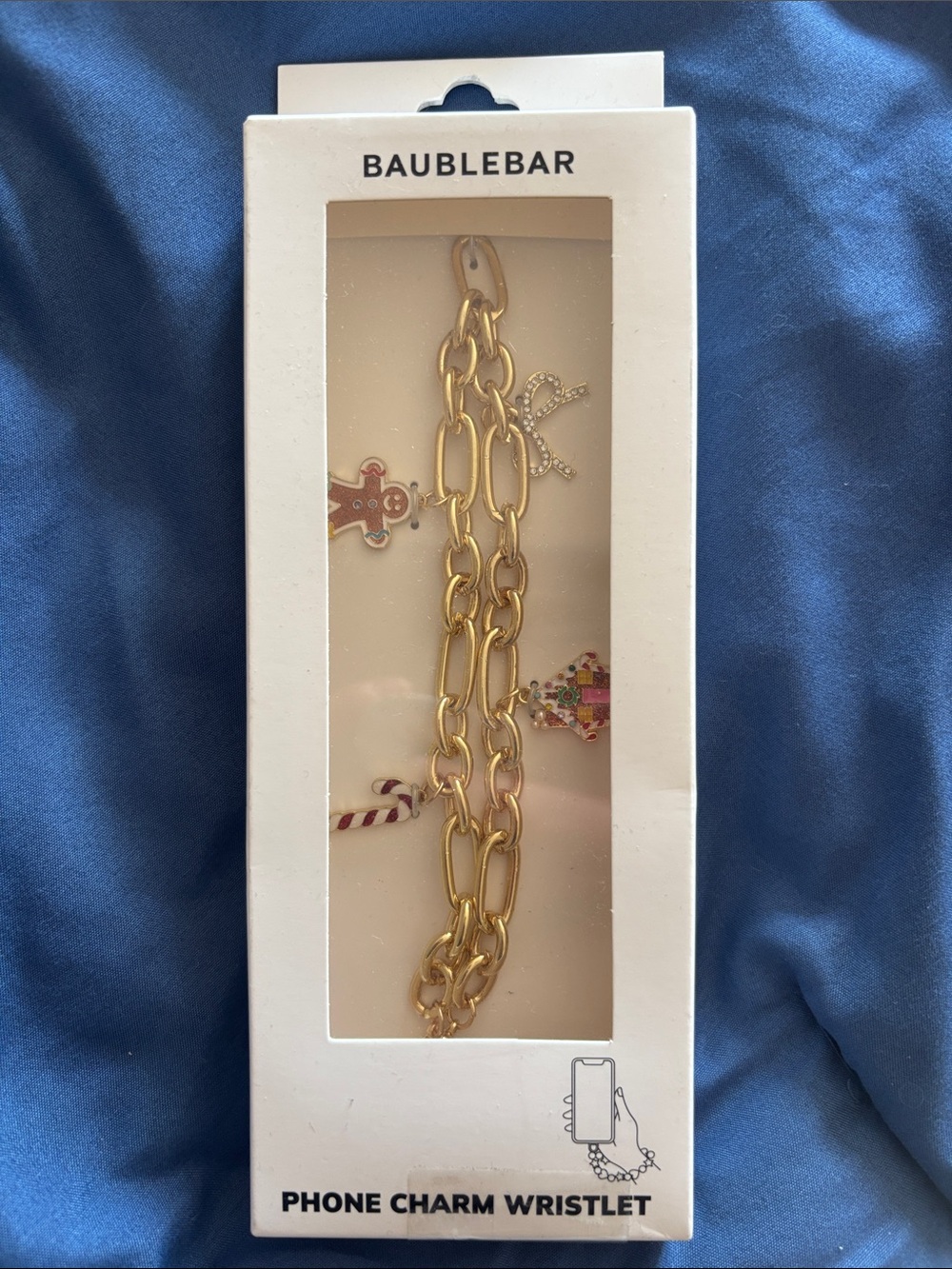 BaubleBar Gold Chain Phone Charm Wristlet with Festive Enamel Charms
